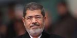 كبير الأطباء الشرعيين الأسبق في مصر يفجر مفاجأة: هذه أسباب وفاة الرئيس محمد مرسي داخل المحكمة - نايل 360